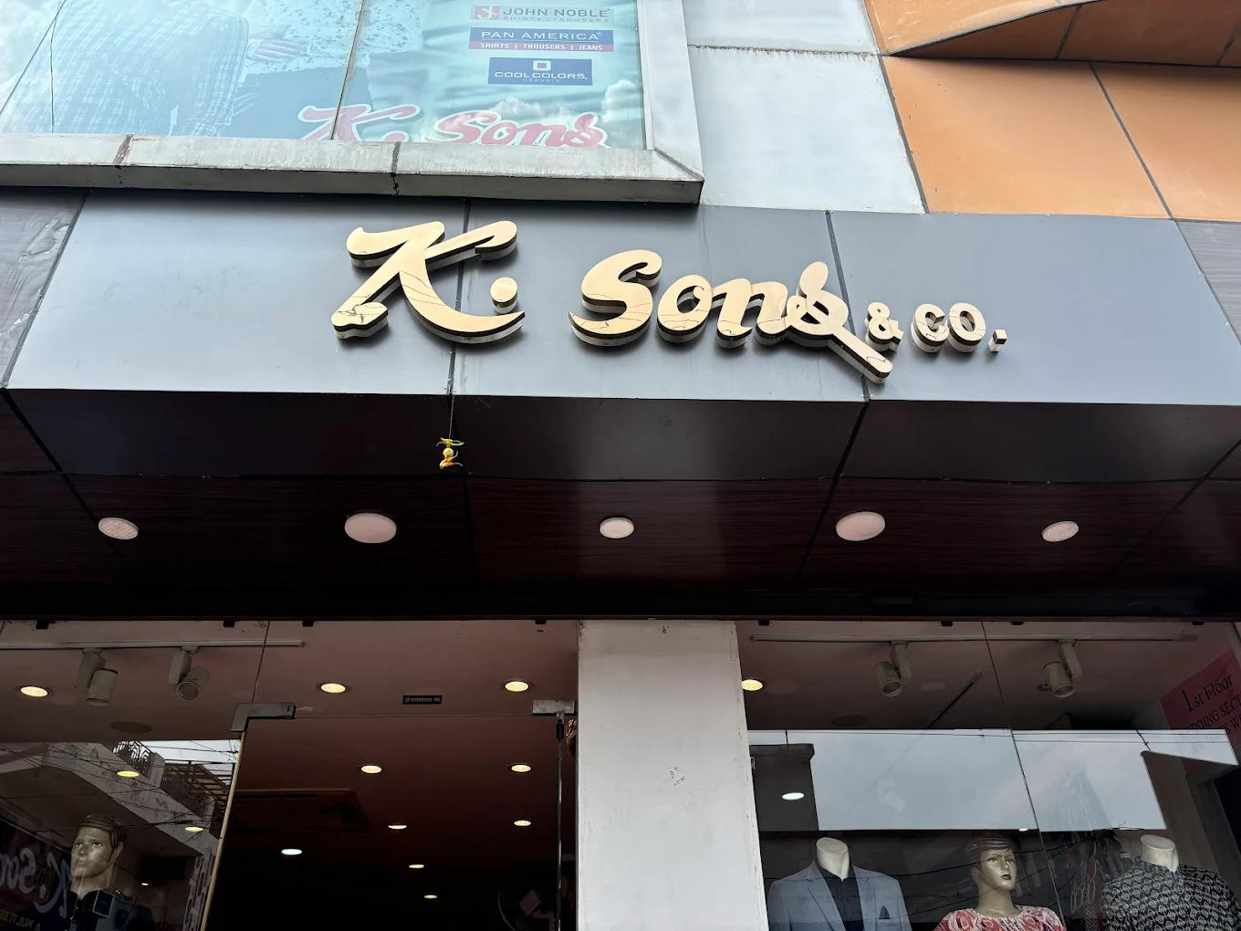 K. Sons storefront facade night view